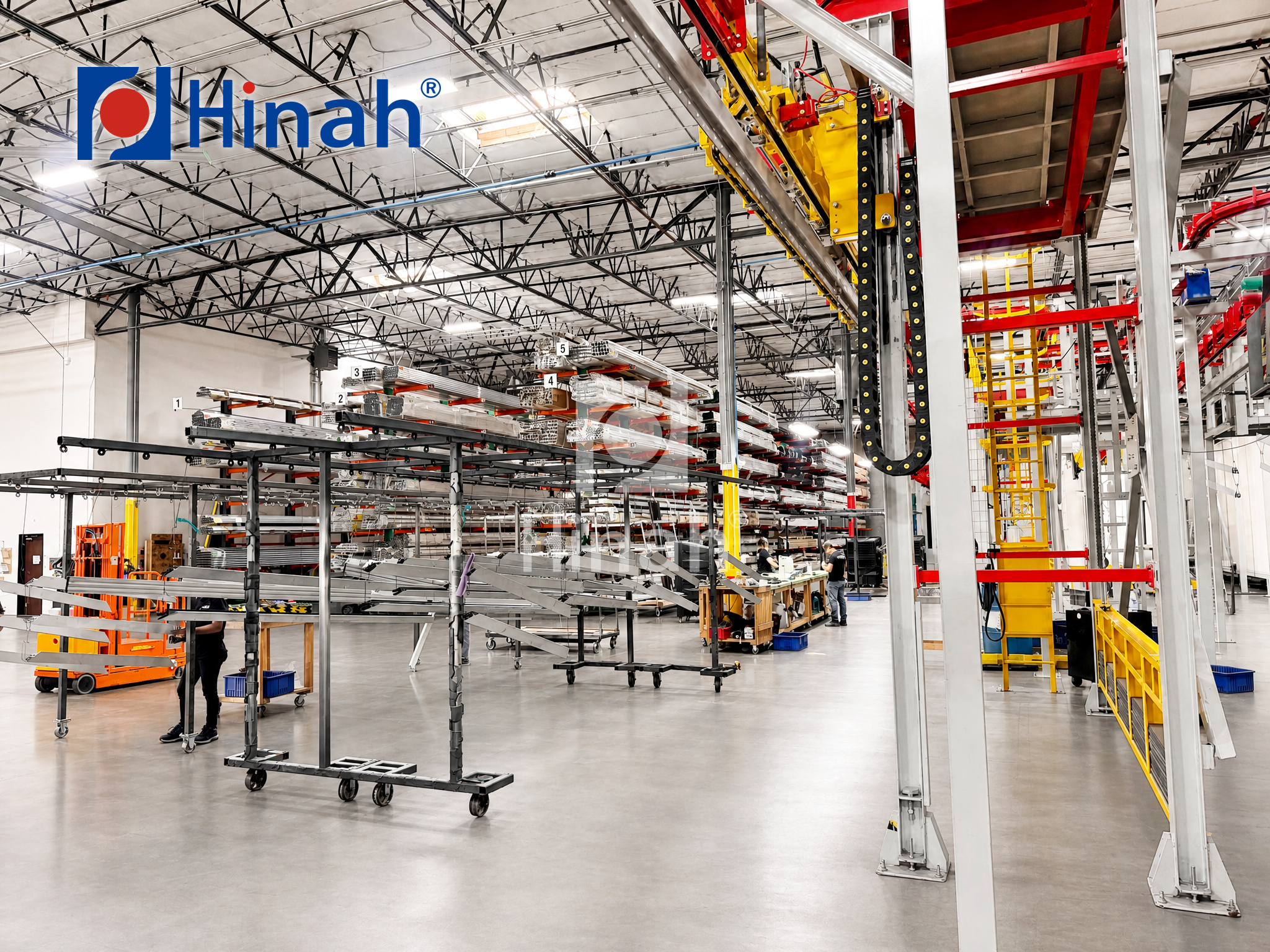 Powder coating plant floor with overhead conveyor and part racks